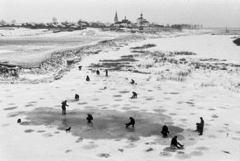Suzdal. Fishermen on a frozen river by Henri Cartier-Bresson (1972)