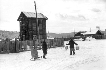 Irkutsk region. A water pump in a village by Henri Cartier-Bresson (1972)