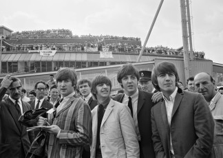 The Beatles at London Airport by Larry Ellis (1964)