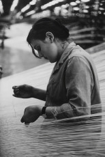 USSR, Women weaving yarn in factory by Louis Stettner (1975)