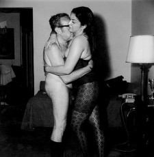 Dominatrix embracing her client by Diane Arbus (1970)