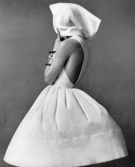 Model in brilliant white summer dress by Louis Faurer (1960)