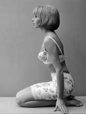 A model posing in underclothes by John French (1964)