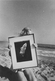 Girl on Beach with Photograph (Deja Vu) by Ralph Gibson (1972)