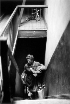 Bessie Fontenelle and Richard Climb the Stairs, Harlem, New York by Gordon Parks (1967)