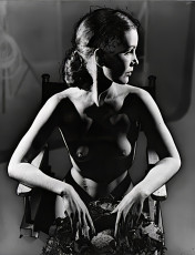 Nude study on chair by John Rawlings (1960)