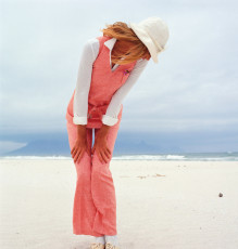 Model in a salmon-colored suit by F.C. Gundlach (1965)