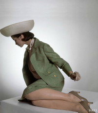 Model in green tweed suit by Evan-Picone by Horst P. Horst (1964)